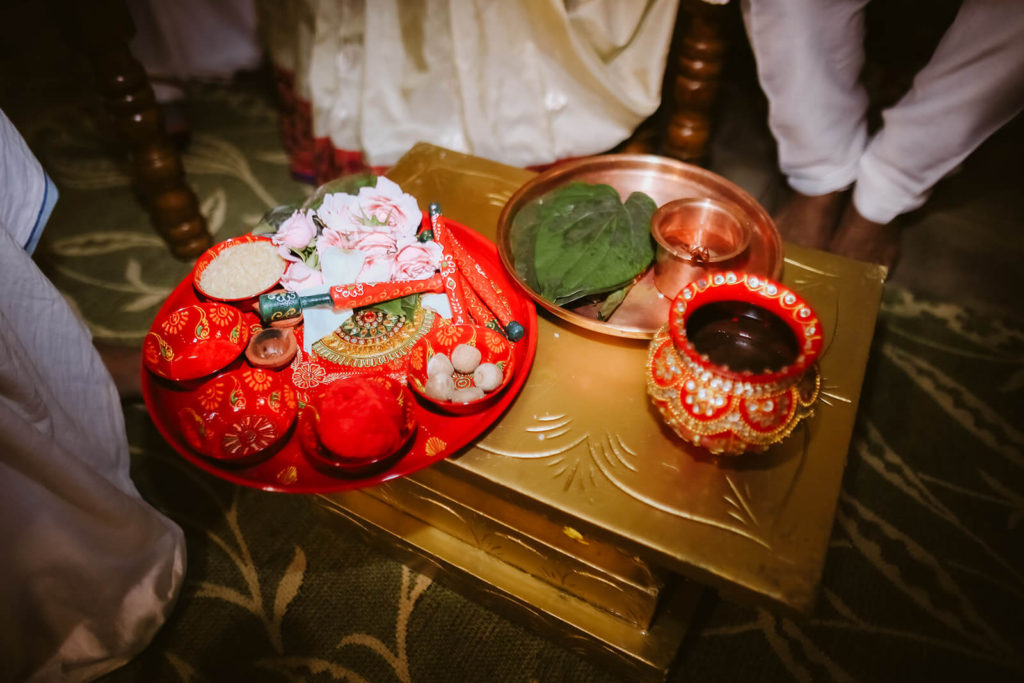 Plates of offerings to be used for a traditional Indian wedding ceremony. Photo by OkCrowe Photography.