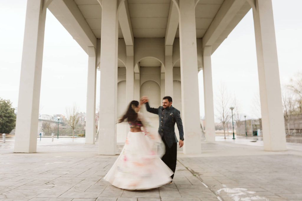 Bride and groom dancing in Downtown Chattanooga. Photo by OkCrowe Photography.