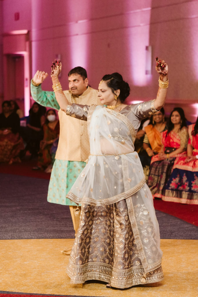 Performances during Sangeet. Photo by OkCrowe Photography.