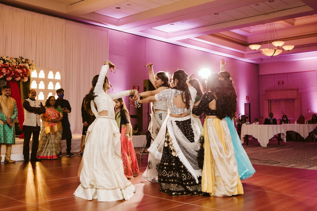 Performances during Sangeet. Photo by OkCrowe Photography.