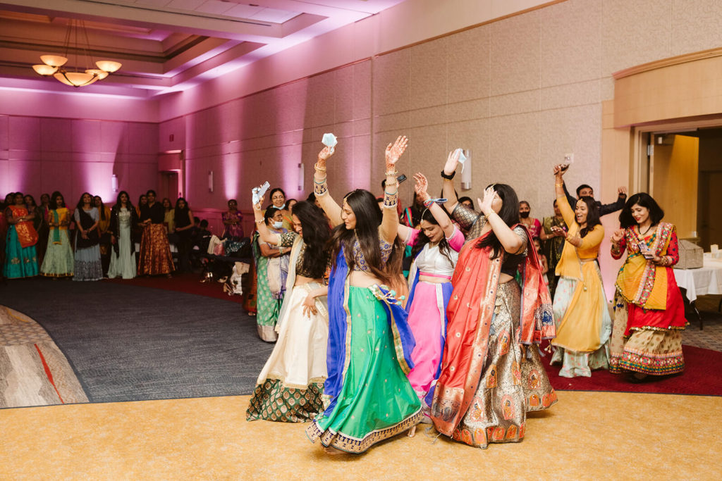 Performances during Sangeet. Photo by OkCrowe Photography.