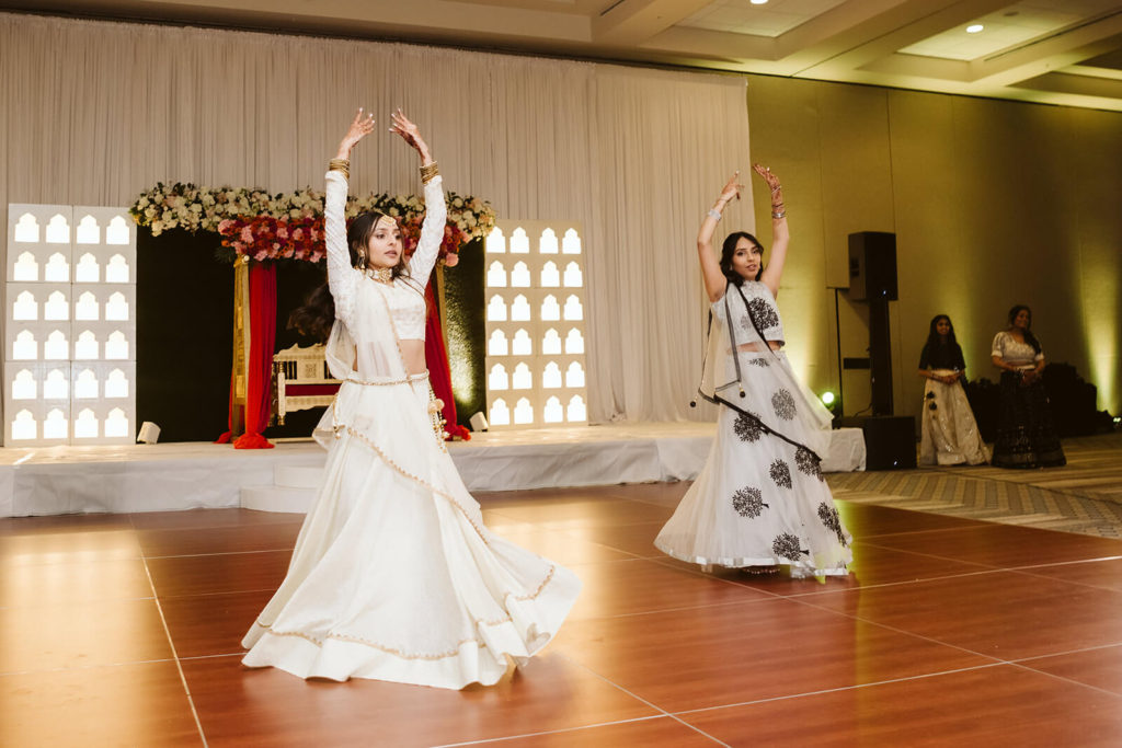 Performances during Sangeet. Photo by OkCrowe Photography.