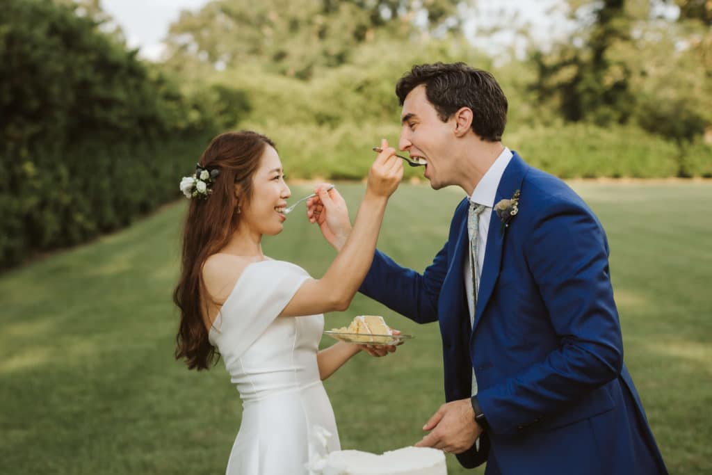 Wedding reception during an upscale backyard wedding. Photo by OkCrowe Photography.