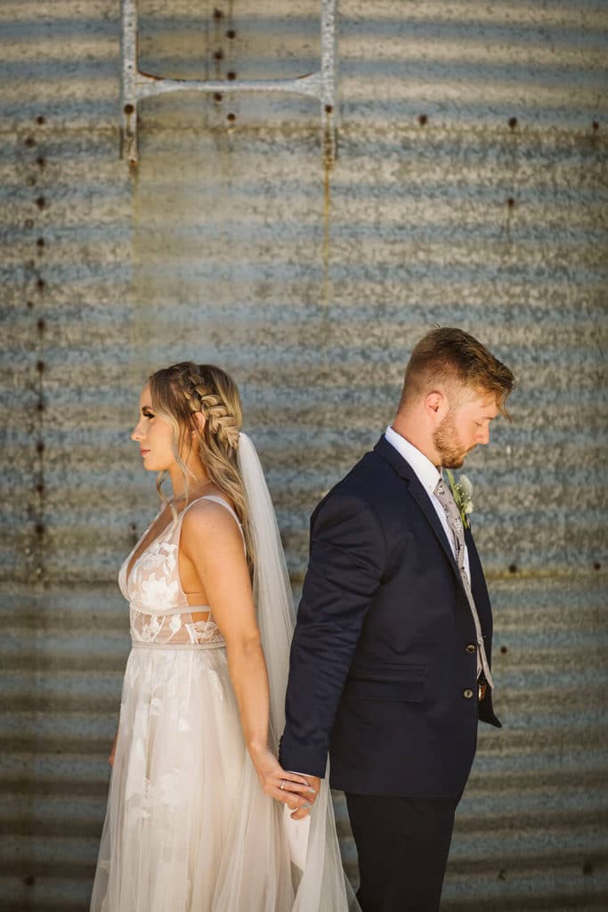 Reading private notes to each other and first look session at the Venue at Lilly Lou's. Photo by OkCrowe Photography.