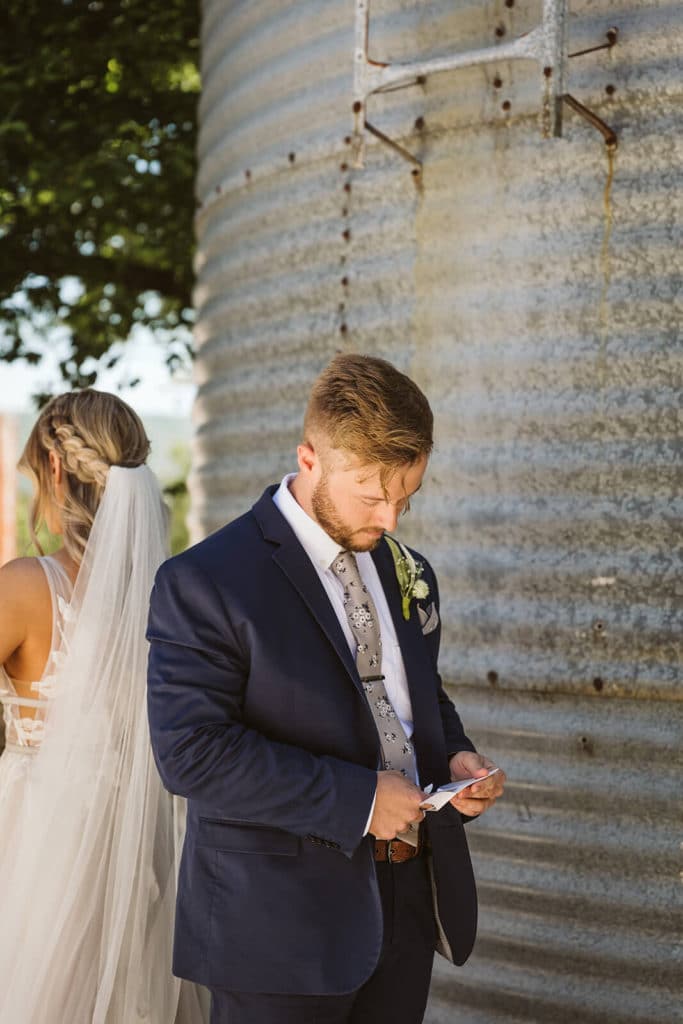 Reading private notes to each other and first look session at the Venue at Lilly Lou's. Photo by OkCrowe Photography.