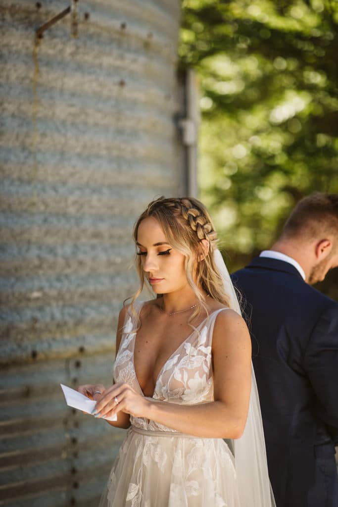 Reading private notes to each other and first look session at the Venue at Lilly Lou's. Photo by OkCrowe Photography.