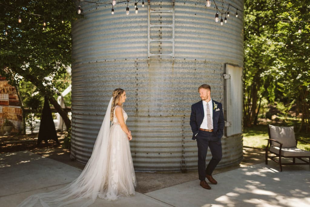 Reading private notes to each other and first look session at the Venue at Lilly Lou's. Photo by OkCrowe Photography.