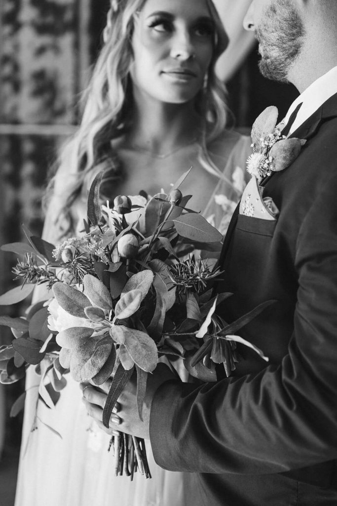 Bride and groom portraits at the Venue at Lilly Lou's. Photo by OkCrowe Photography.