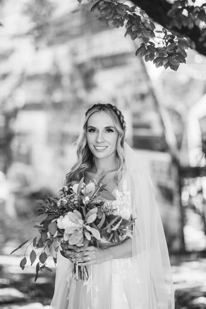 Bride and groom portraits at the Venue at Lilly Lou's. Photo by OkCrowe Photography.