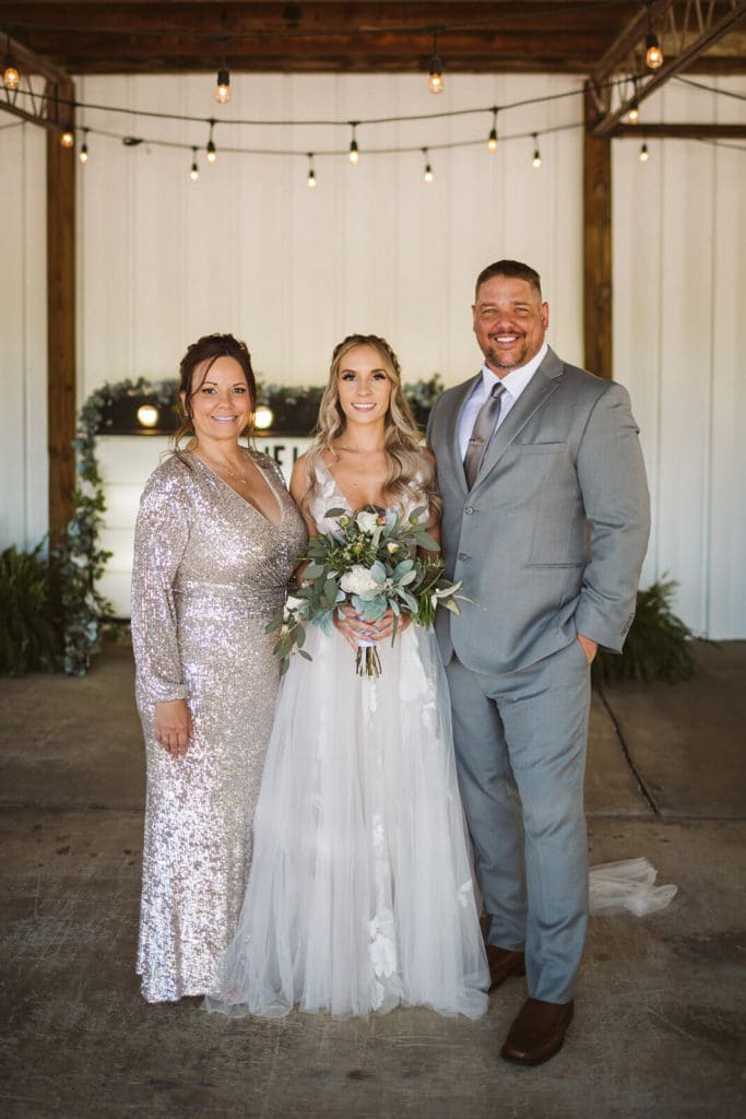 Friends and family portraits at the Venue at Lilly Lou's. Photo by OkCrowe Photography.