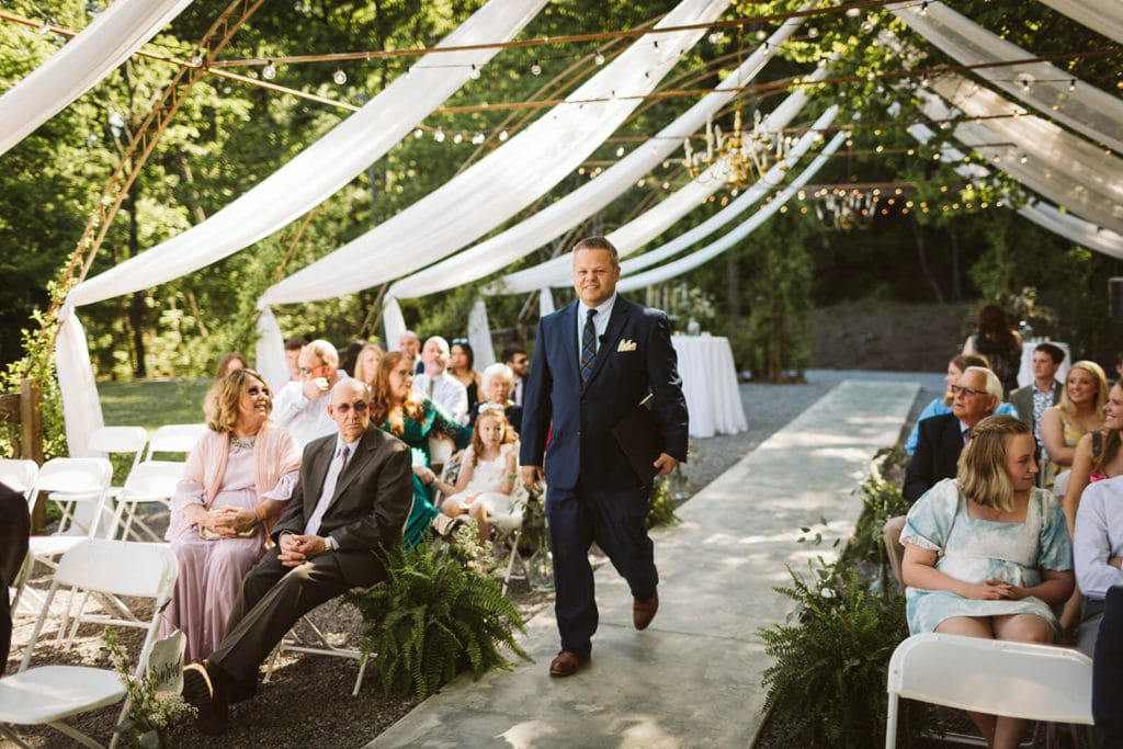 Garden wedding ceremony at the Venue at Lilly Lou's. Photo by OkCrowe Photography.