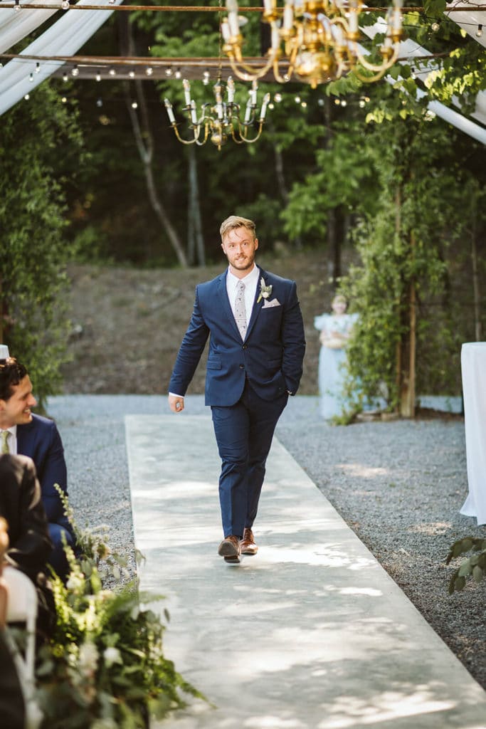 Garden wedding ceremony at the Venue at Lilly Lou's. Photo by OkCrowe Photography.