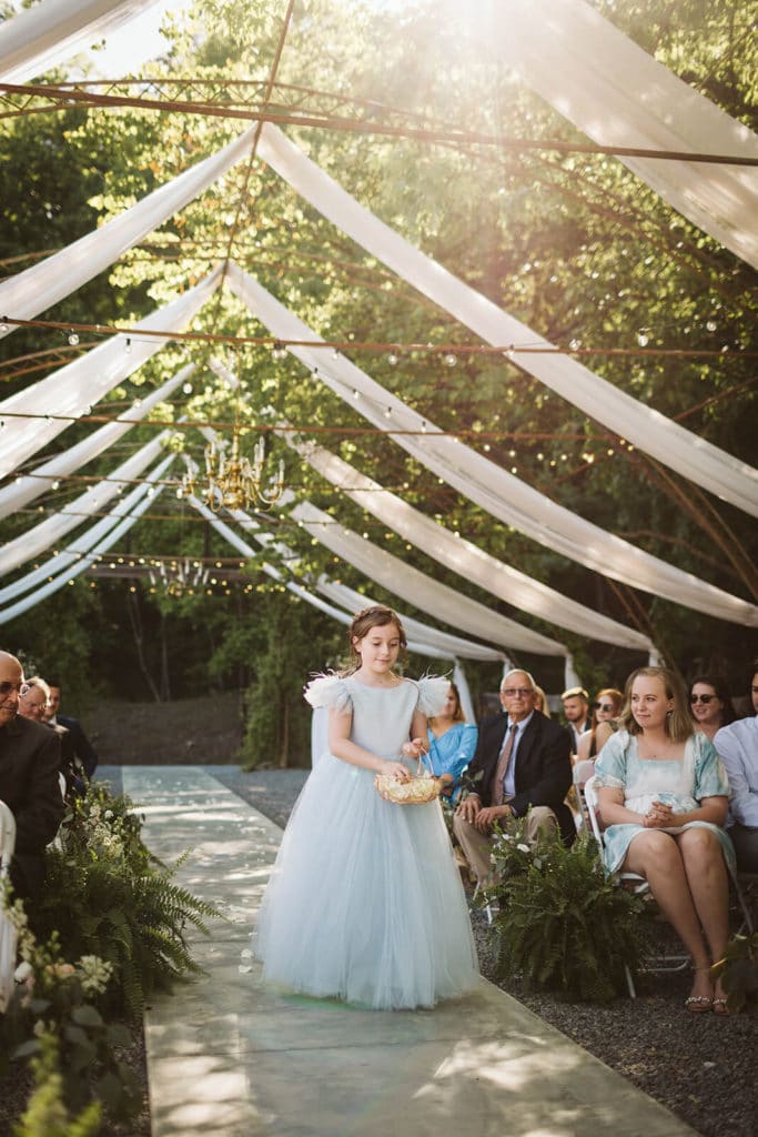 Garden wedding ceremony at the Venue at Lilly Lou's. Photo by OkCrowe Photography.