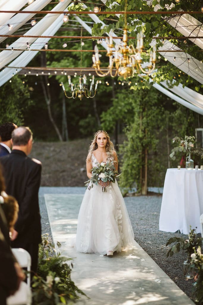 Garden wedding ceremony at the Venue at Lilly Lou's. Photo by OkCrowe Photography.