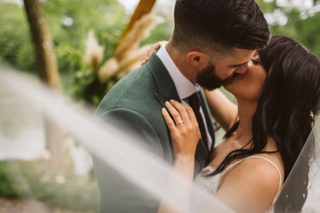 Newlywed portraits at Hiwassee River Weddings. Photo by OkCrowe Photography.