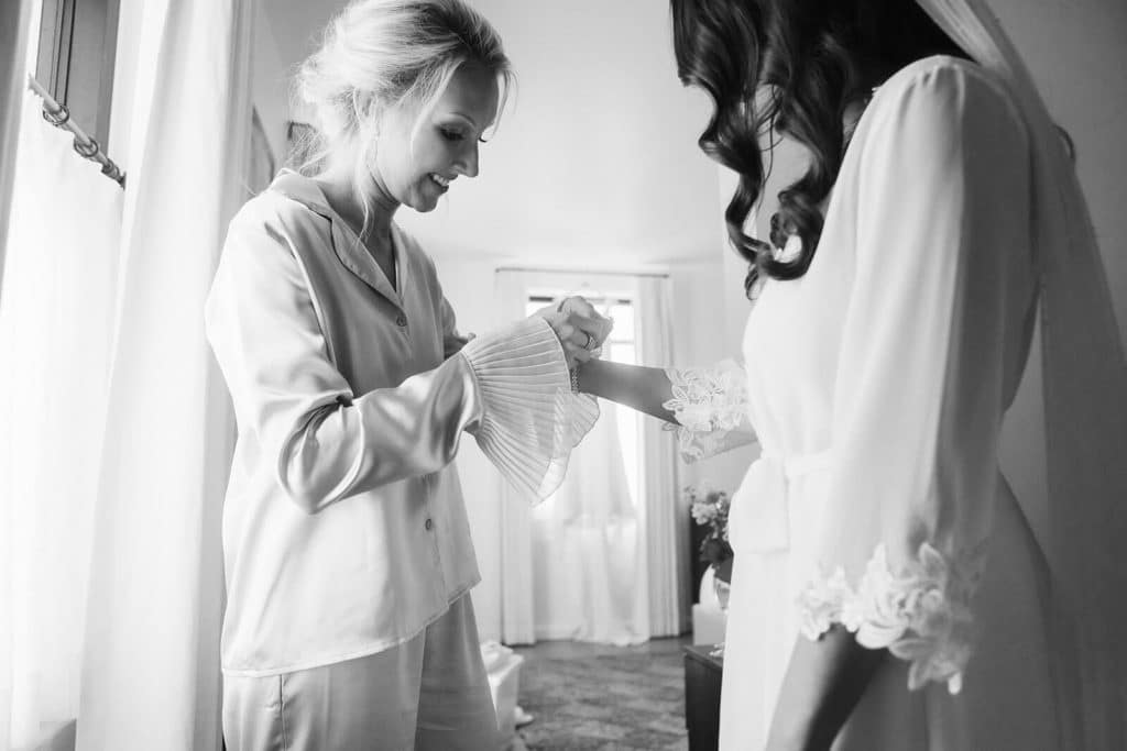 Bride and bridal party getting ready at the Common House in Chattanooga. Photo by OkCrowe Photography.