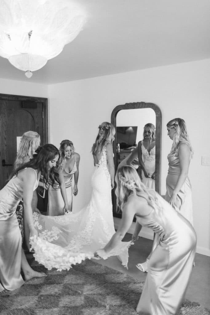 Bridesmaids first look at the Common House in Chattanooga. Photo by OkCrowe Photography.