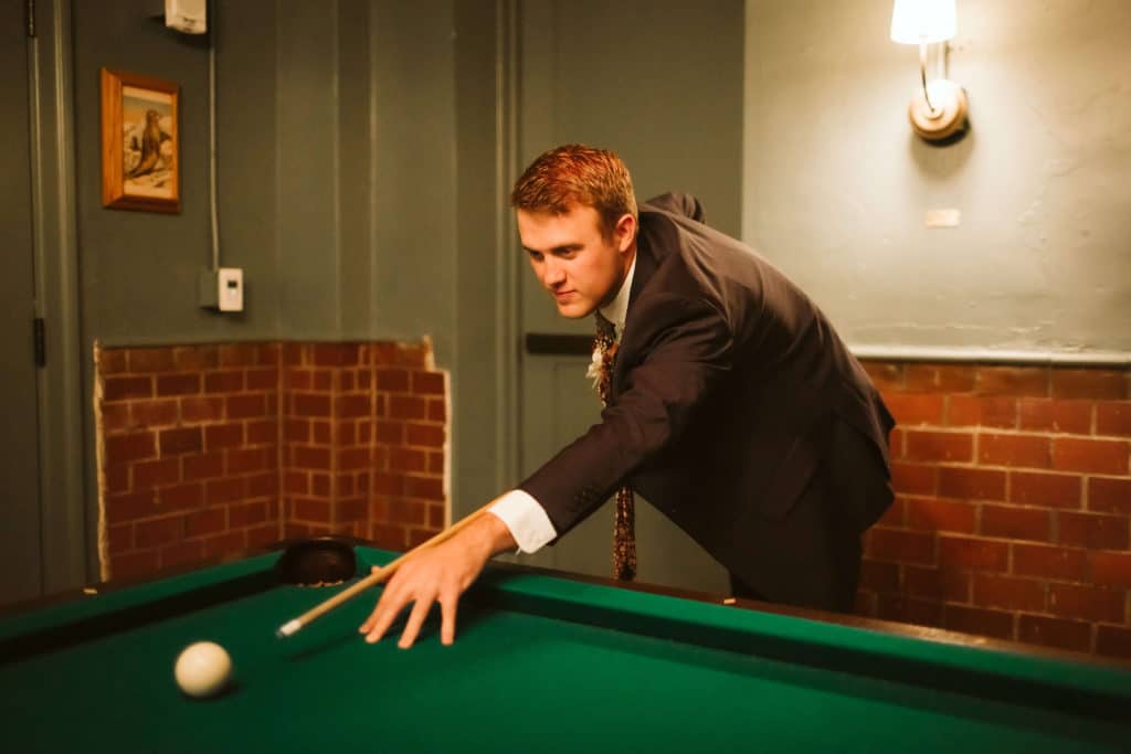 Groom portraits at the Common House in Chattanooga. Photo by OkCrowe Photography.