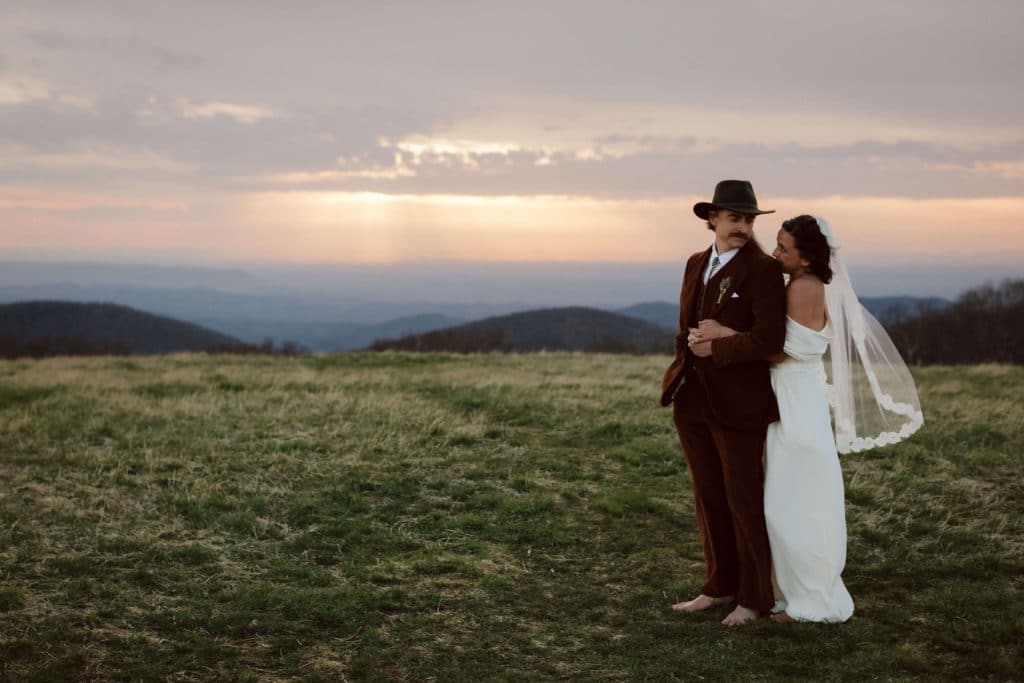 Bride and groom portraits at a secret North Carolina mountain elopement. Photo by OkCrowe Photography.