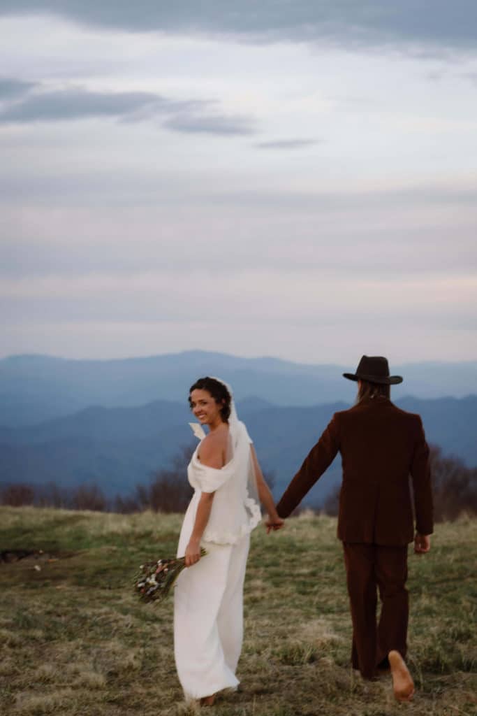 Bride and groom portraits at a secret North Carolina mountain elopement. Photo by OkCrowe Photography.