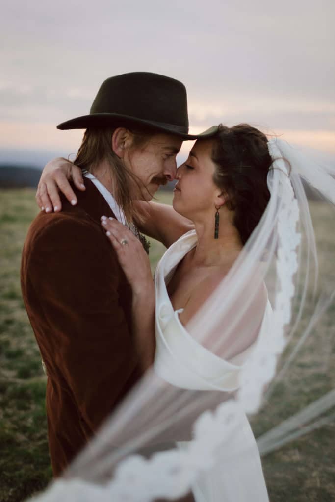 Bride and groom portraits at a secret North Carolina mountain elopement. Photo by OkCrowe Photography.