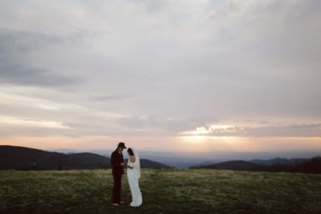 Bride and groom portraits at a secret North Carolina mountain elopement. Photo by OkCrowe Photography.