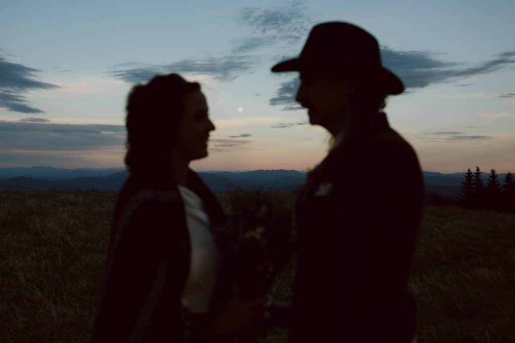 Bride and groom portraits at a secret North Carolina mountain elopement. Photo by OkCrowe Photography.