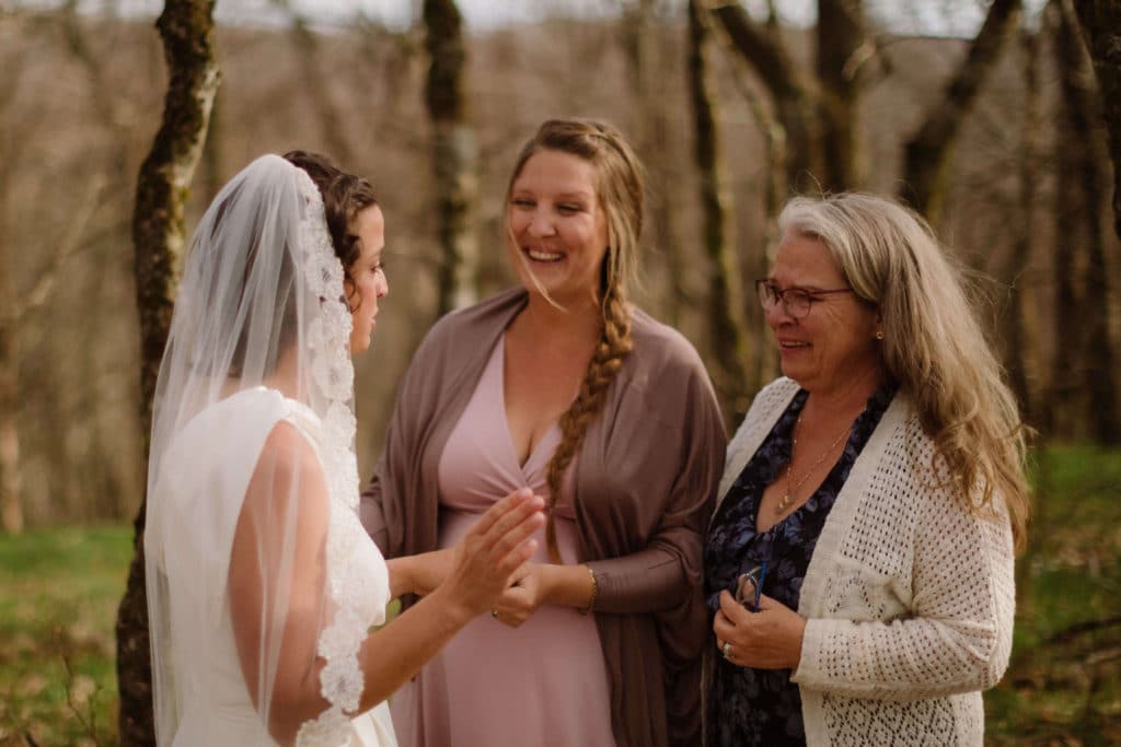 Getting ready for a secret North Carolina mountain elopement. Photo by OkCrowe Photography.