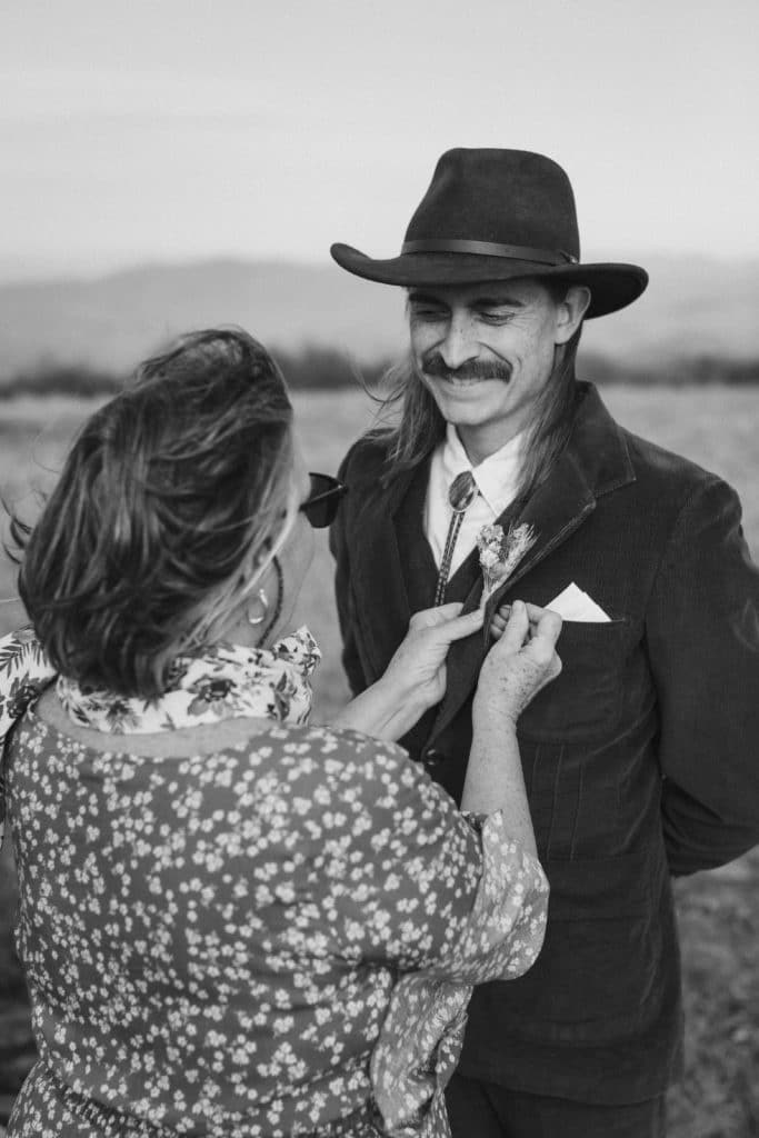 Getting ready for a secret North Carolina mountain elopement. Photo by OkCrowe Photography.