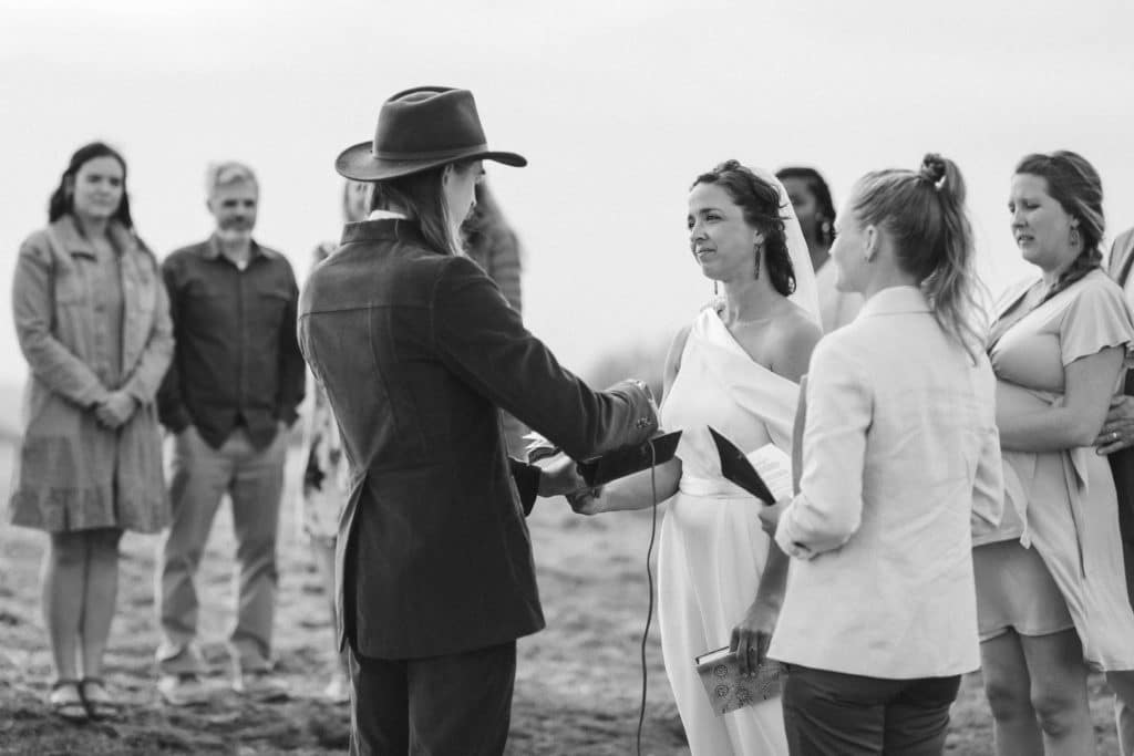 Ceremony at a secret North Carolina mountain elopement. Photo by OkCrowe Photography.