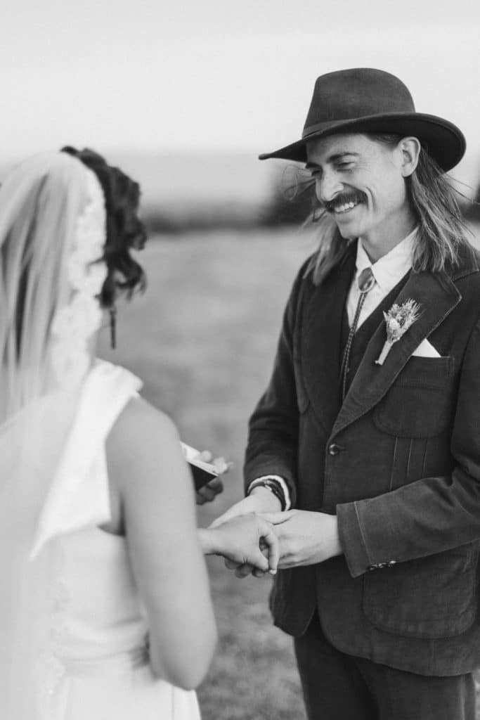 Ceremony at a secret North Carolina mountain elopement. Photo by OkCrowe Photography.