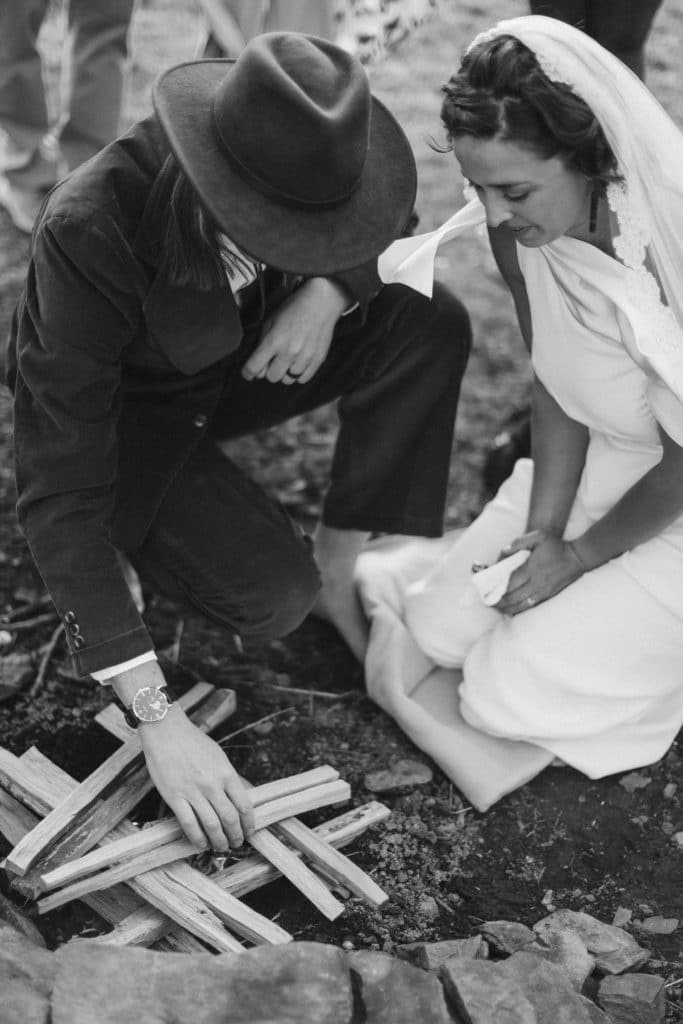 Ceremony at a secret North Carolina mountain elopement. Photo by OkCrowe Photography.