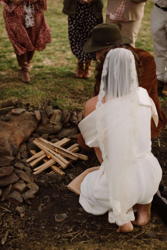 Ceremony at a secret North Carolina mountain elopement. Photo by OkCrowe Photography.