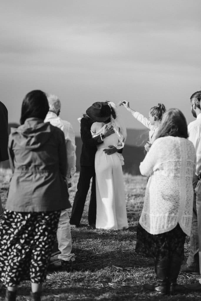 Ceremony at a secret North Carolina mountain elopement. Photo by OkCrowe Photography.