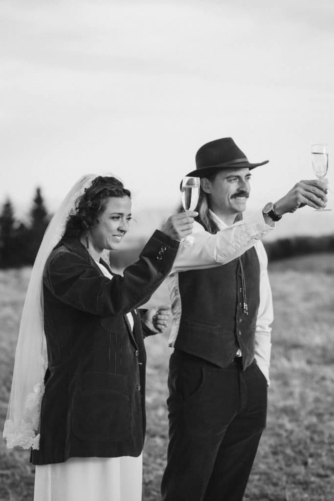 Friends and family at a secret North Carolina mountain elopement. Photo by OkCrowe Photography.