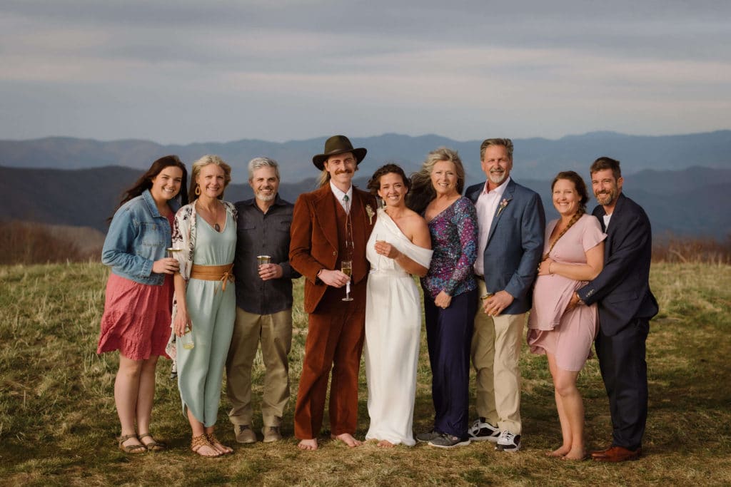 Friends and family at a secret North Carolina mountain elopement. Photo by OkCrowe Photography.