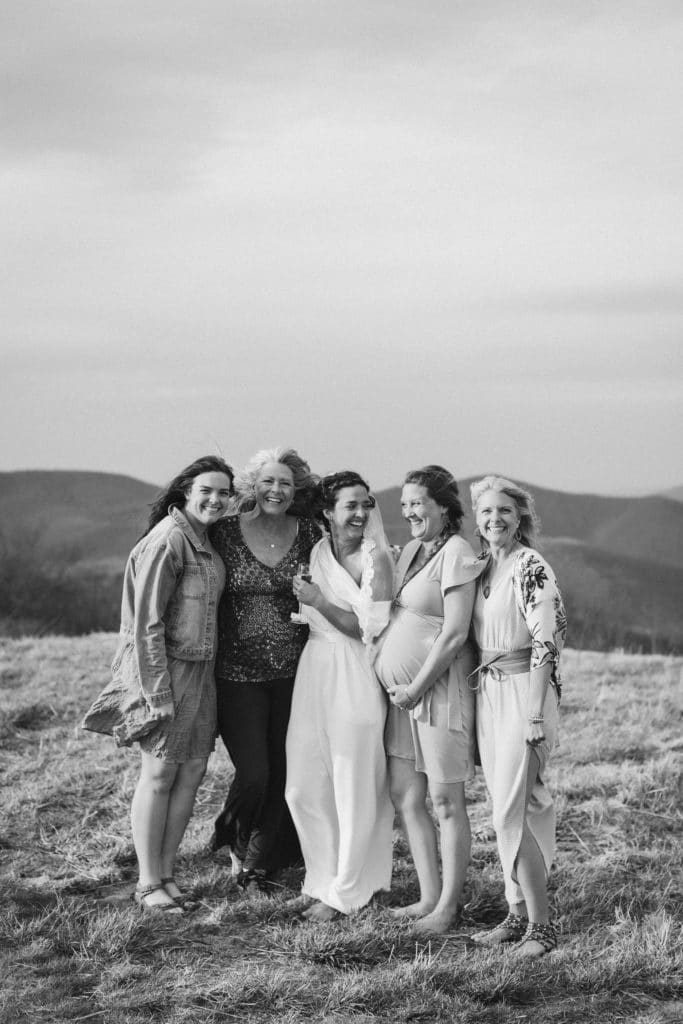 Friends and family at a secret North Carolina mountain elopement. Photo by OkCrowe Photography.