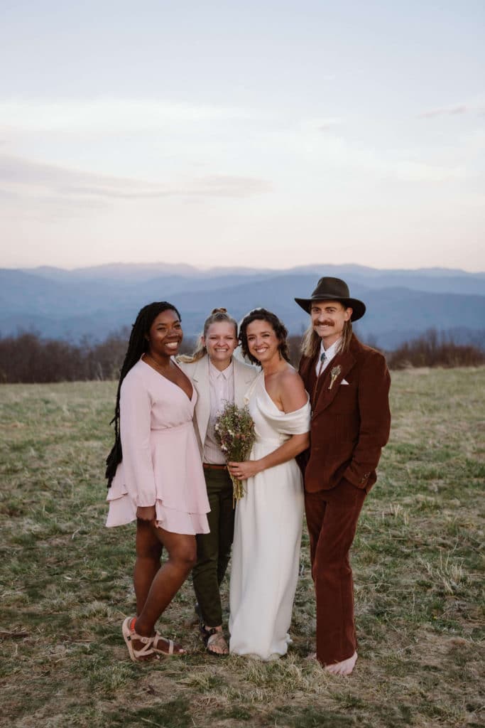 Friends and family at a secret North Carolina mountain elopement. Photo by OkCrowe Photography.