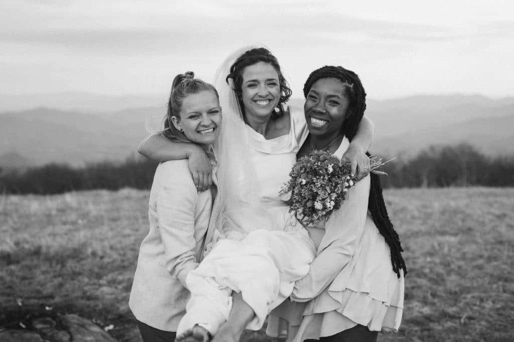 Friends and family at a secret North Carolina mountain elopement. Photo by OkCrowe Photography.