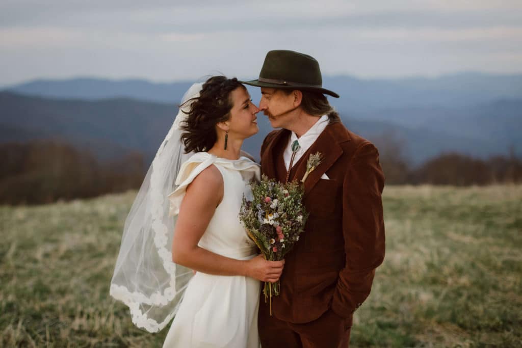 Bride and groom portraits at a secret North Carolina mountain elopement. Photo by OkCrowe Photography.