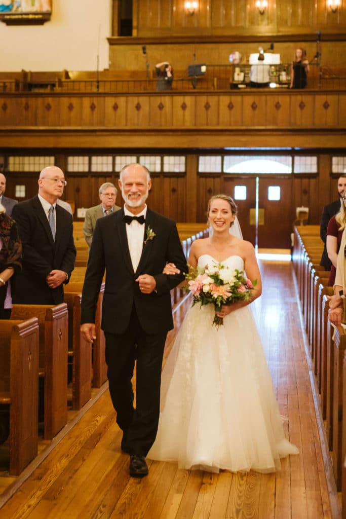 Ceremony at the Basilica of Saints Peter and Paul. Photo by OkCrowe Photography.