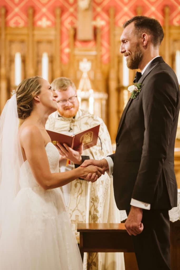 Ceremony at the Basilica of Saints Peter and Paul. Photo by OkCrowe Photography.