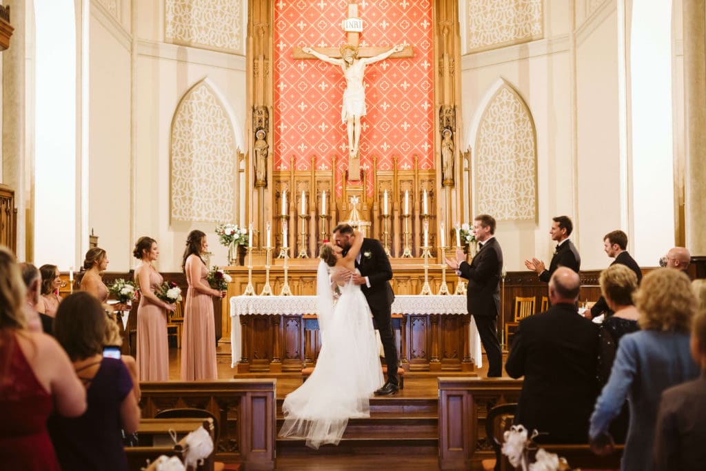 Ceremony at the Basilica of Saints Peter and Paul. Photo by OkCrowe Photography.