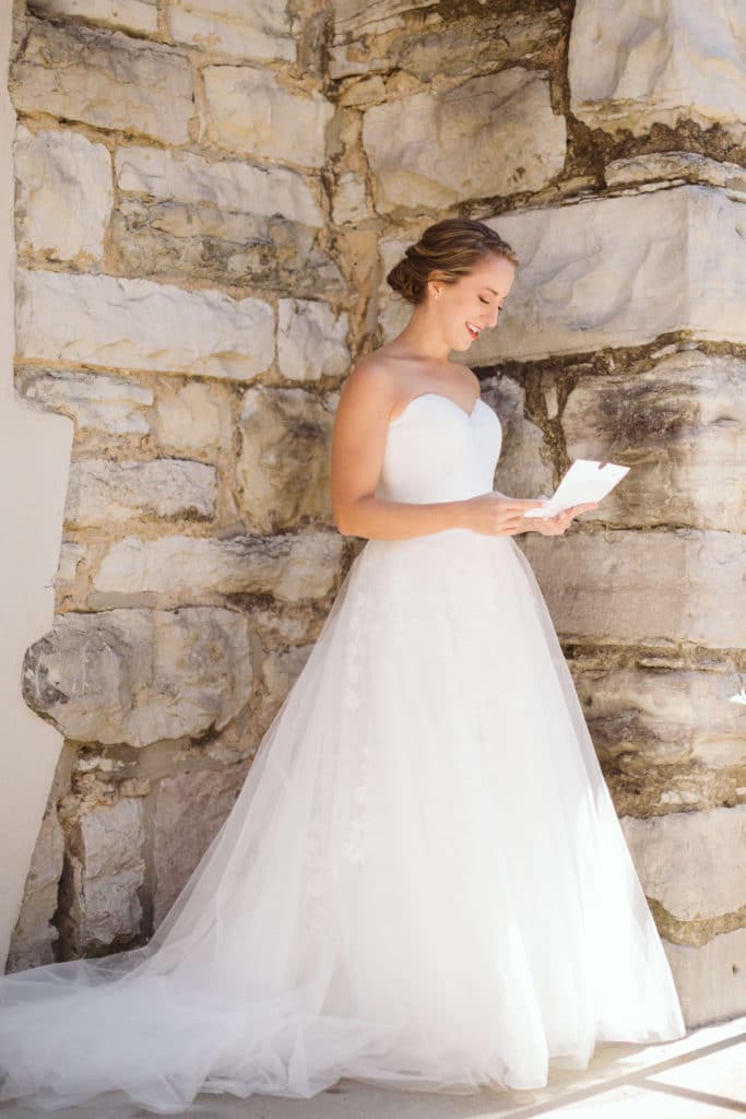 Getting ready at the Basilica of Saints Peter and Paul. Photo by OkCrowe Photography.