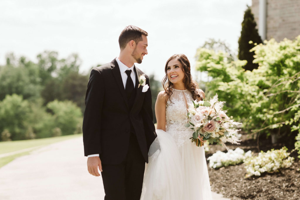 Bride and groom at the Views at Sunset Ridge. Photo by OkCrowe Photography.