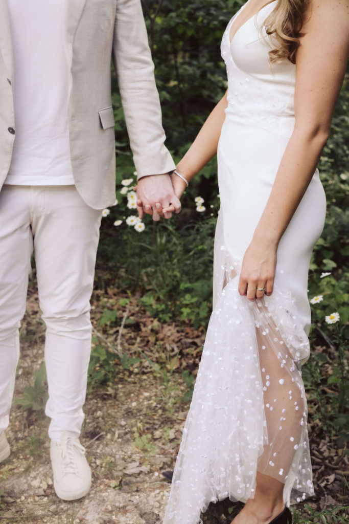 Bride and groom portraits on the ground of Howe Farms. Photo by OkCrowe Photography.