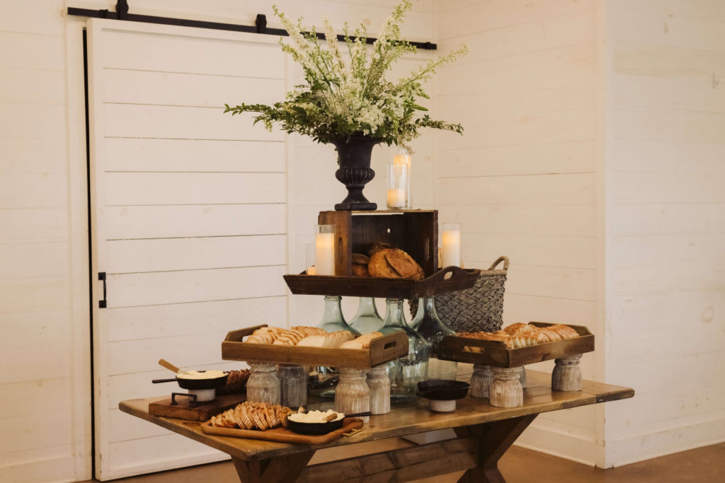 Buffet dinner by Ramblewood Events on the Highlands Chapel Patio at Howe Farms. Photo by OkCrowe Photography.