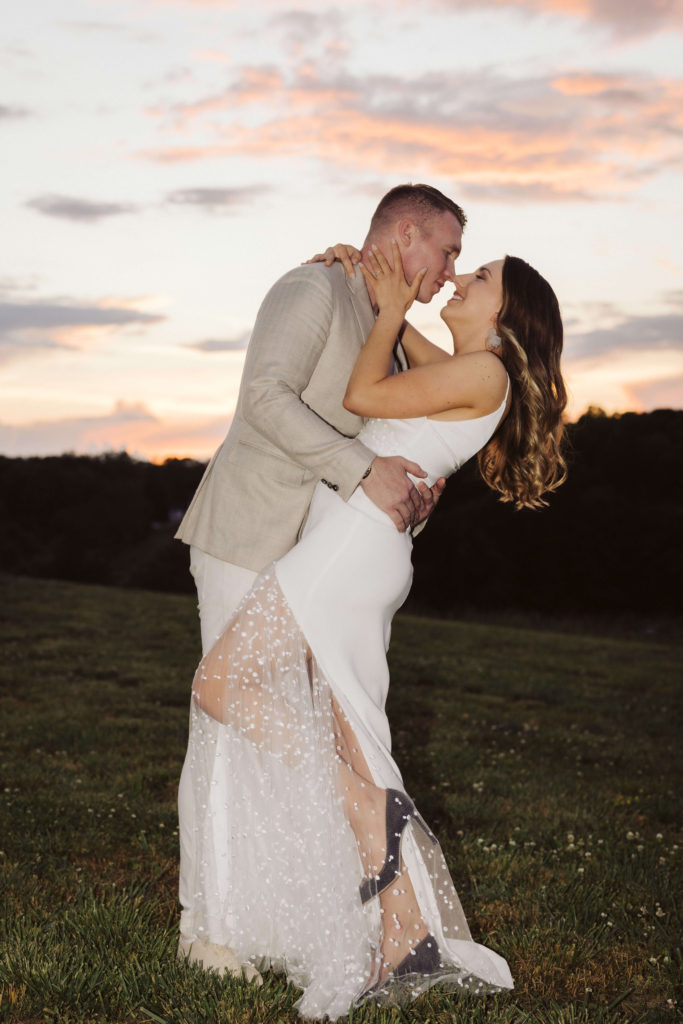 Sunset bride and groom portraits at Howe Farms. Photo by OkCrowe Photography.