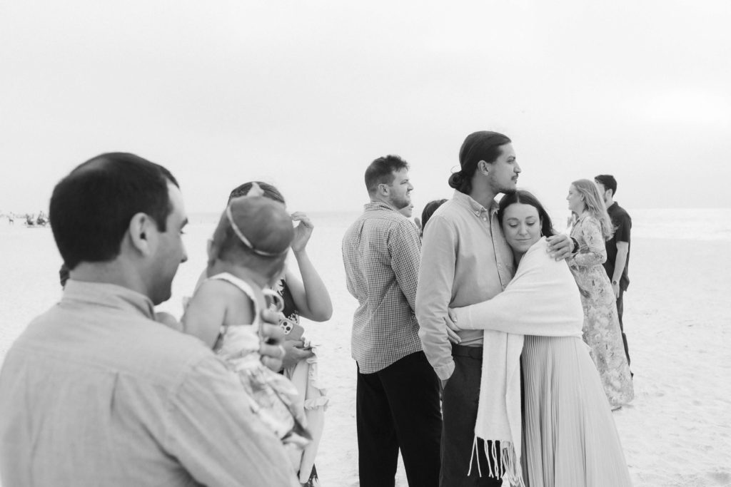 Rehearsal dinner photography coverage on a beach in Sarasota, FL. Photo by OkCrowe Photography.