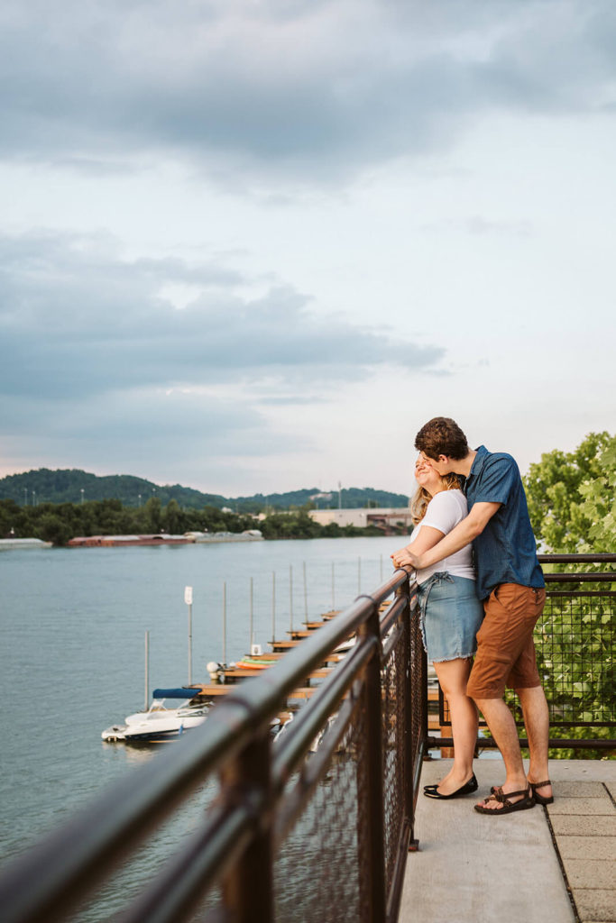 Engagement session in the Riverwalk in Chattanooga by the river. Photo by OkCrowe Photography.